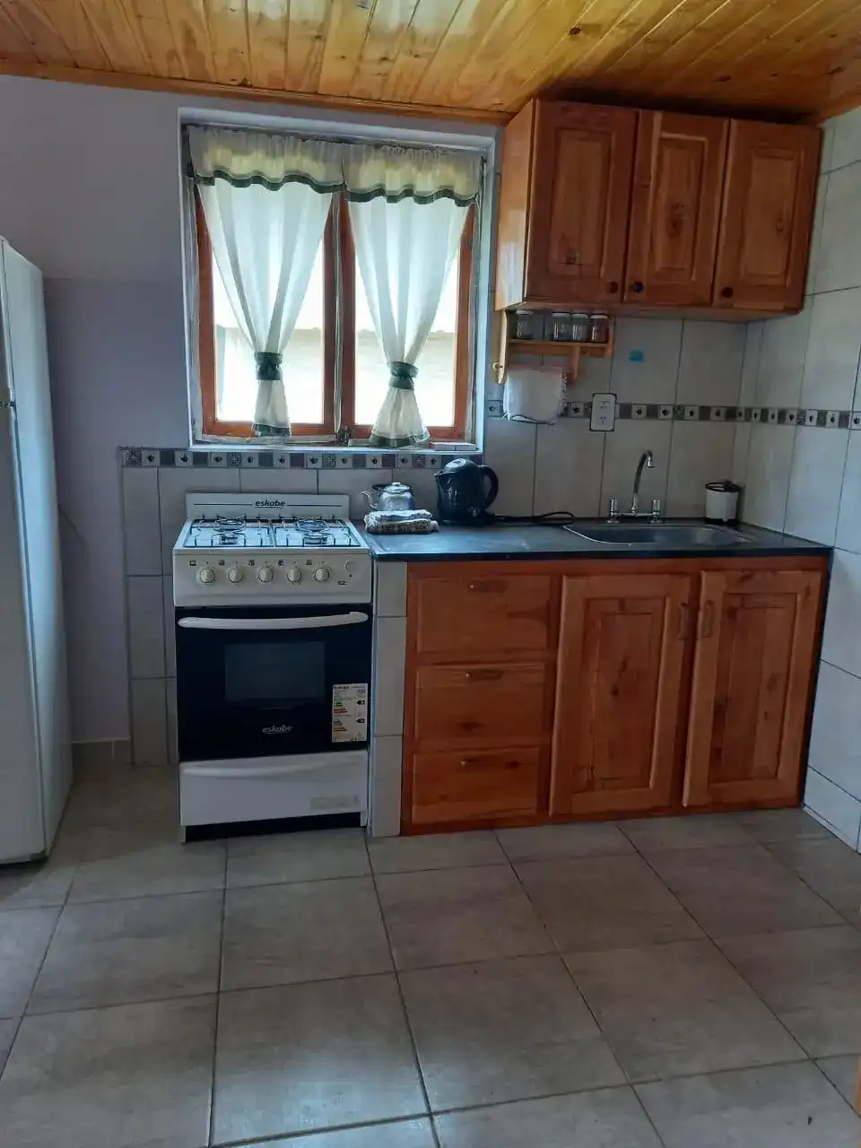 Interior de Cabaña Andesita vista a la cocina